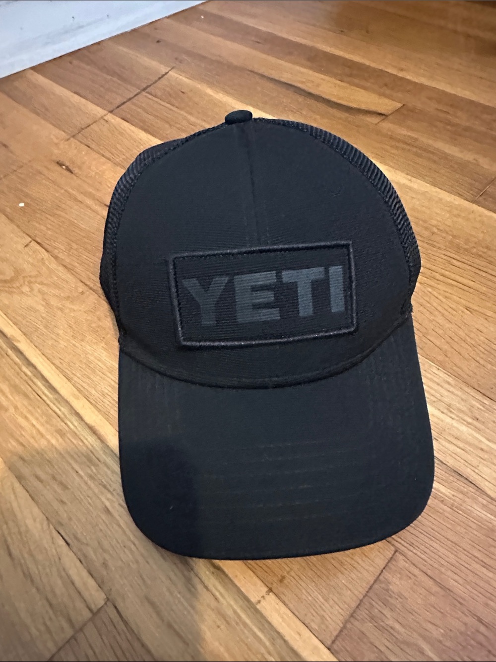 Yeti Black Mesh Logo Trucker Hat